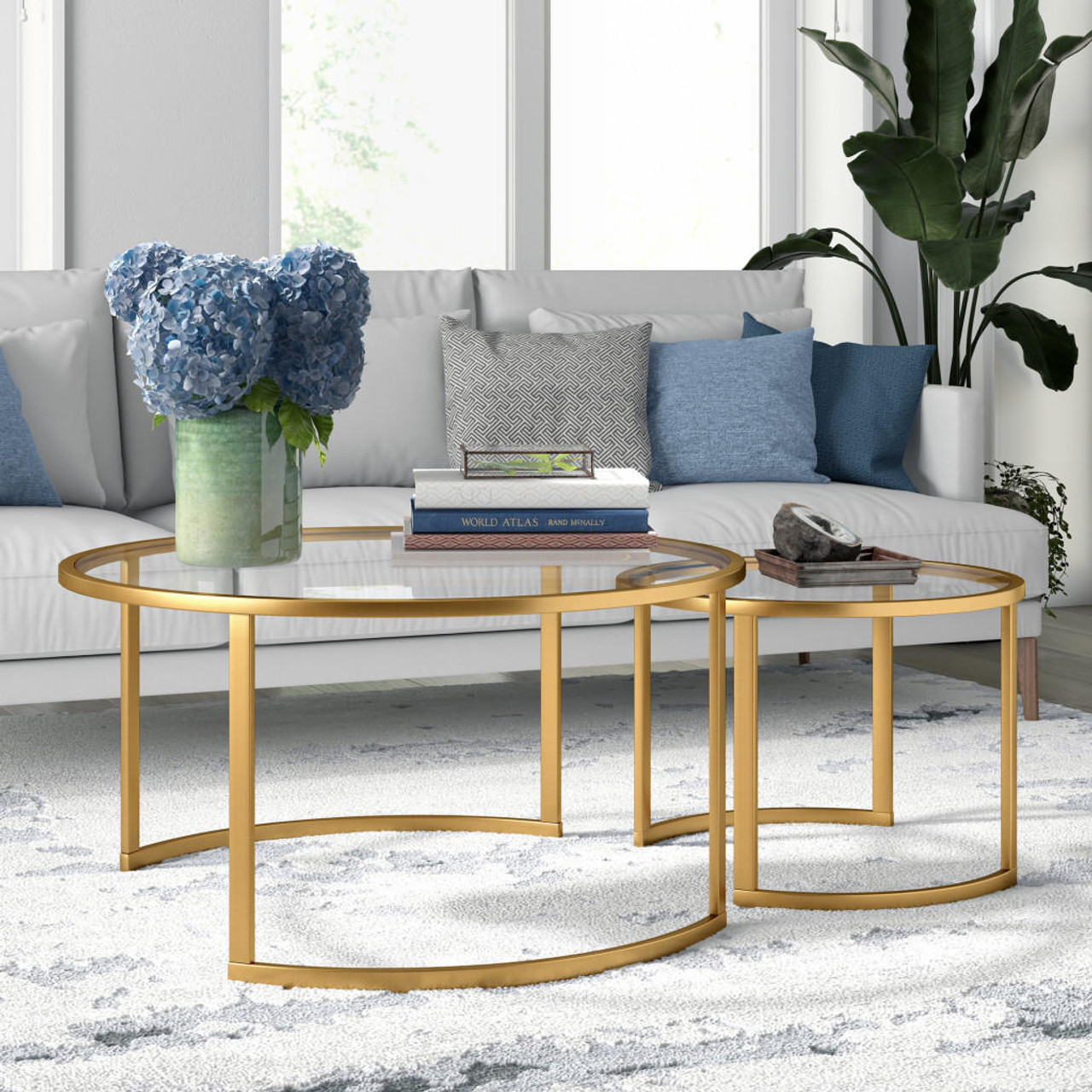 homeroots living room Set Of Two 36" Gold and Glass Round Nested Coffee Tables 