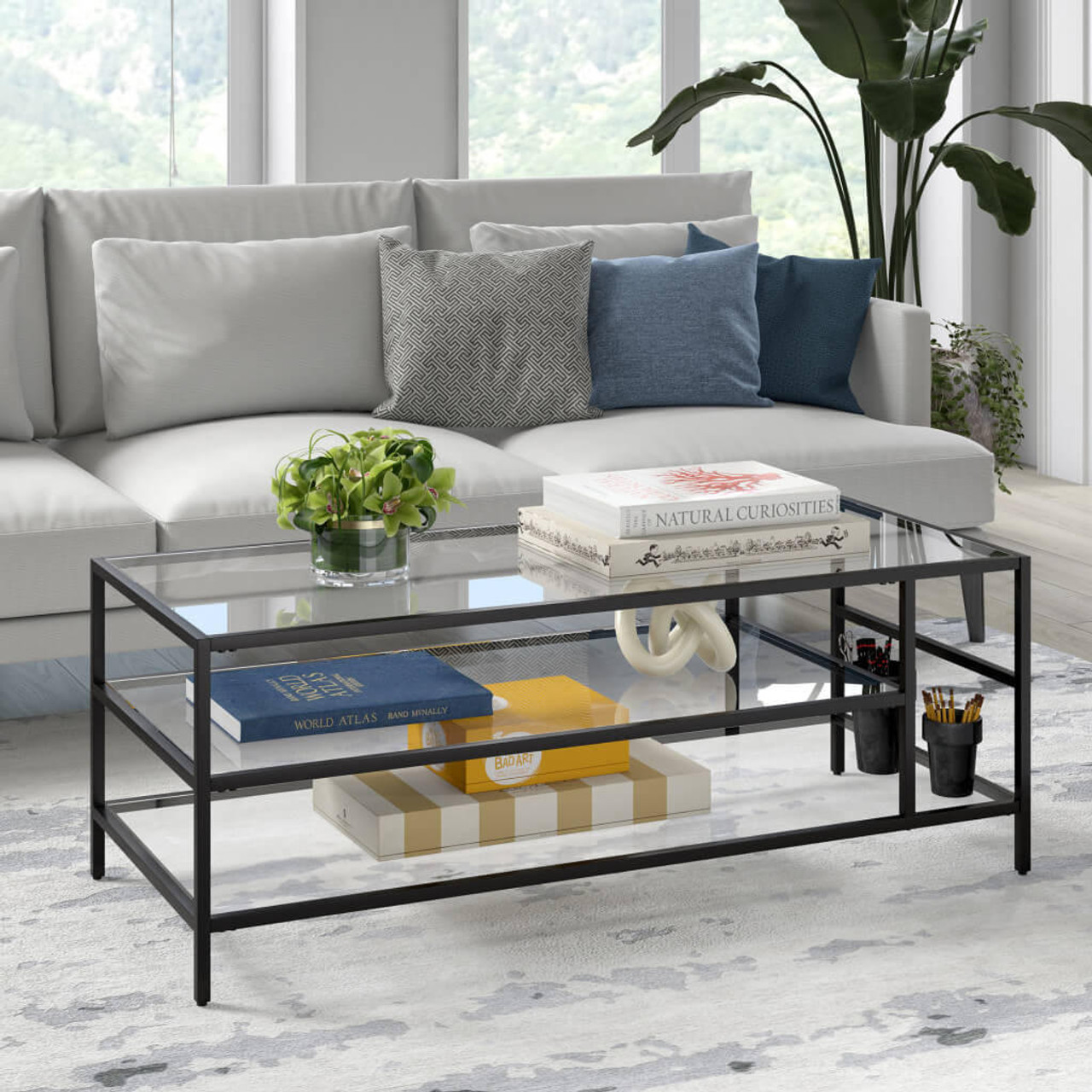 homeroots living room 46" Black Glass Rectangular Coffee Table With Two Shelves 