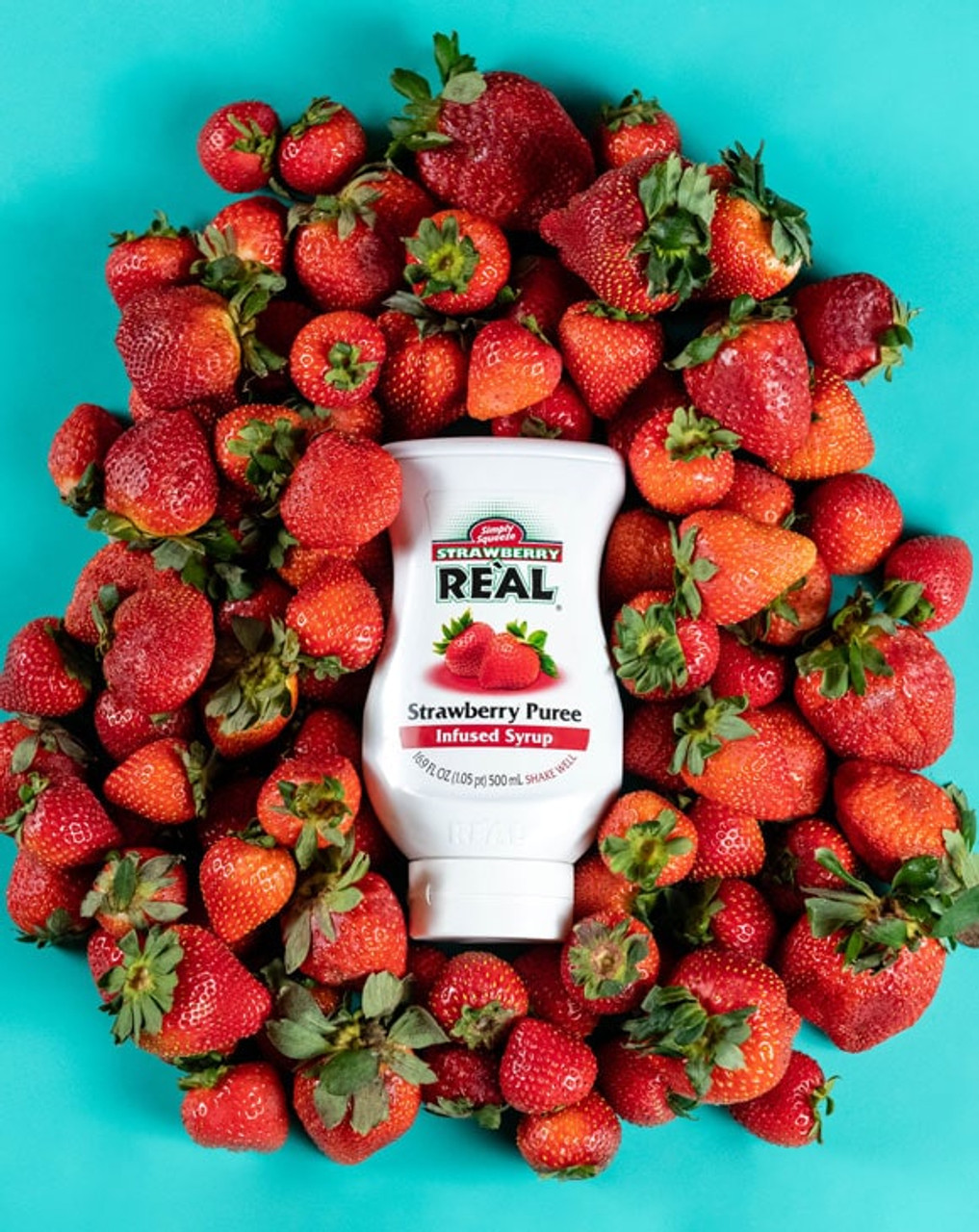 Real 16.9 fl. oz. Strawberry Puree Infused Syrup - Sweet Strawberry Flavor - Chicken Pieces