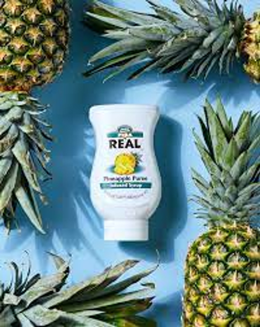 Real 16.9 fl. oz. Pineapple Puree Infused Syrup - Refreshing Tropical Flavor - Chicken Pieces