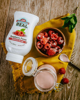 Real 16.9 fl. oz. Raspberry Puree Gourmet Infused Syrup-Chicken Pieces