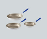 Vollrath 8", 10", and 12" 3-Piece Aluminum Non-Stick Frying Pans-Chicken Pieces