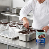 J. Hungerford Smith Chocolate Enrober Coating - 23 lb. (10.43 kg)-Chicken Pieces