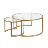 homeroots living room Set Of Two 36" Gold and Glass Round Nested Coffee Tables 