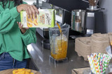DaVinci Gourmet 64 fl. oz. Extreme Peach Real Fruit Smoothie Mix - (6/Case) - Chicken Pieces
