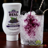 Real 16.9 fl. oz. Blackberry Puree Infused Syrup - Sweet and Tart Flavor - Chicken Pieces