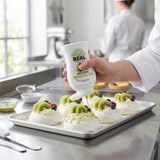 Real 16.9 fl. oz. Kiwi Puree Infused Syrup - Sweet and Tart Flavor for Cocktails - Chicken Pieces