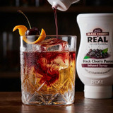 Real 16.9 fl. oz. Black Cherry Puree Infused Syrup - Sweet and Tart Flavor - Chicken Pieces