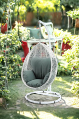 Green And White Metal Swing Chair With Cushion