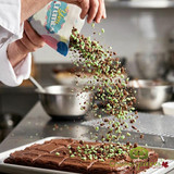 gourmet-mint-chocolate-donut-topped-with-yum-crumbs-and-ganache