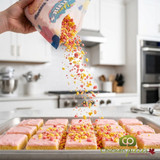 vibrant-strawberry-lemonade-donut-topped-with-yum-crumbs-and-zesty-glaze