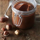 Valrhona Caramelia 36% Milk Chocolate Féve 6.6 lb. - 3/Case - Irresistible Milk Chocolate in Bulk