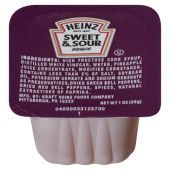 Heinz 1 oz. Sweet and Sour Sauce Portion Cups - 100/Case - Tangy-Sweet Flavor - Chicken Pieces