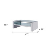 homeroots living room 47" Silver And Clear Glass Rectangular Mirrored Coffee Table With Shelf 