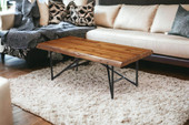 homeroots living room 50" Black And Brown Solid Wood Rectangular Coffee Table 