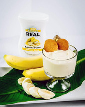 Real 16.9 fl. oz. Banana Puree Infused Syrup - Sweet Creamy Tropical Flavor - Chicken Pieces