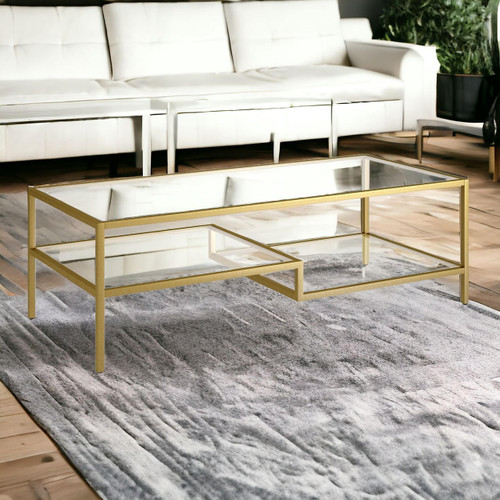 homeroots living room 54" Gold and Glass Rectangular Coffee Table With Two Shelves  homeroots living room 54" Gold and Glass Rectangular Coffee Table With Two Shelves