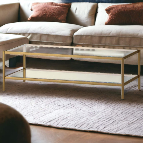 homeroots living room 54" Gold And Clear Glass Rectangular Coffee Table With Shelf  homeroots living room 54" Gold And Clear Glass Rectangular Coffee Table With Shelf