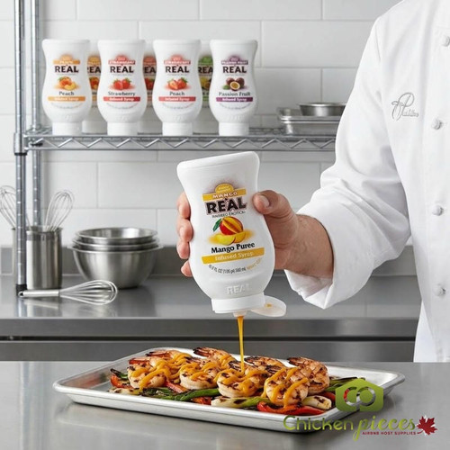 Real 16.9 fl. oz. Mango Puree Infused Syrup - Refreshing Tropical Flavor - Chicken Pieces