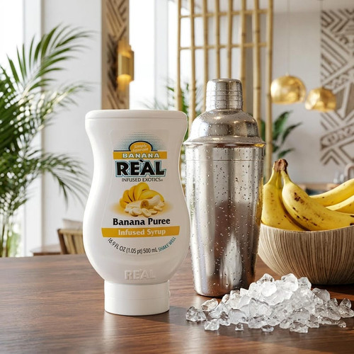 Real 16.9 fl. oz. Banana Puree Infused Syrup - Sweet Creamy Tropical Flavor - Chicken Pieces