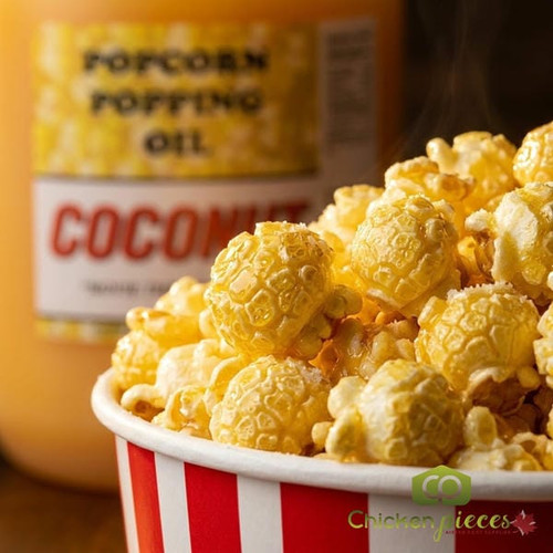 Paragon 1015 coconut popcorn oil one gallon jug
Golden movie theater popcorn popped with coconut oil
Close up of coconut popcorn oil being added to a kettle