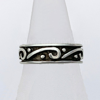 The Glenna is a solid rimmed band that has scrolls and beads all the way around. The Glenna is a solid rimmed band that has scrolls and beads all the way around.