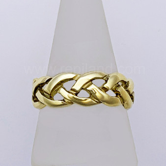 Heavy, pierced braided knotwork band. 14kt Yellow gold.