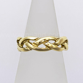 Heavy, pierced braided knotwork band. 14kt Yellow gold. Heavy, pierced braided knotwork band. 14kt Yellow gold.