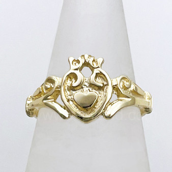 Claddagh ring with heart, crown and v shape side with curl. Yellow gold.