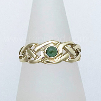 The Gwynfor Gem Ring has intricate pierced knotwork with a 4mm gem at the center. Shown in 14kt yellow gold with Green Tourmaline.