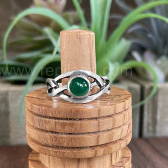 The Mwynen Gem ring features curving pierced knotwork & a 6mm gemstone. Shown with Green Agate.