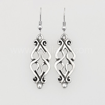 The Fadó Knot Earrings are formed from two overlapping heart shapes with curled ends and large bead accents at the bottom.