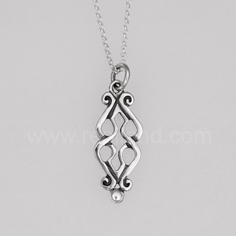 The Fadó Knot Pendant is formed from two overlapping heart shapes with curled ends and large bead accents at the bottom.