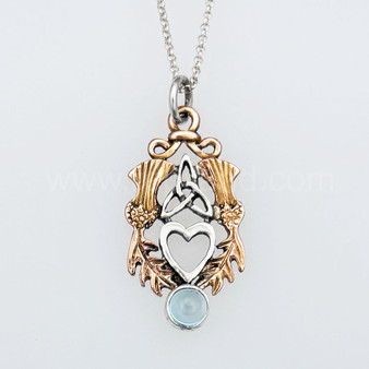 The Lannier Gem Pendant features thistles, leaves, a trinity knot, a heart and a 6mm gem. Pictured in rose gold, sterling and Blue Topaz.