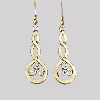 The Grian Triskele Earrings feature a graceful twist drop with a triskele. Shown in 14kt yellow gold.