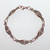 Link bracelet featuring trinity knots flanking a central bead in an almond shape frame. Shown in rose gold.