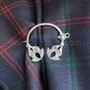 The Eige Penannular features stylized double thistles, shown on the Clan Home Tartan.
