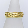  The Glenna is a solid rimmed band with scrolls and beads all the way around. Shown in 14kt Yellow gold.