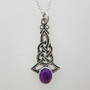 The Brigantia Gem Pendant features intricate knotwork with a grooved center and flares out at the bottom above a 10x8mm gemstone. Shown with Amethyst.