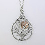 The Bard Owl Tree Pendant in sterling with rose gold moon.