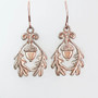 The Grizel Earrings feature a capped acorn framed with oak leaves. Shown in rose gold.