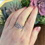 The Esras Knot Ring, shown on size 7 finger.