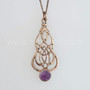 The Blàth Gem Pendant has intricate knotwork and an 8mm gemstone. Shown in 14kt rose gold with Amethyst.