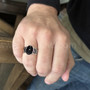 The Dain Gem Ring features grooved knotwork, beads and a 10x14 gemstone. Shown with Onyx on size 12 finger.