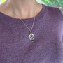 The Lannir Gem Pendant, shown for scale.