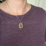 The Lannir Gem Pendant, shown for scale.