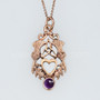The Lannier Gem Pendant features thistles, leaves, a trinity knot, a heart and a 6mm gem. Pictured in rose gold with Amethyst.