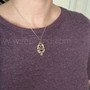 The Lannir Gem Pendant, shown for scale.