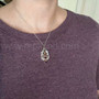 The Lannir Gem Pendant, shown for scale.