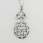 The Vorthr Knot Pendant has stylized serpent dragon heads above a large circular shield knot.